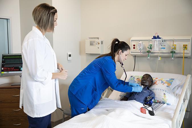 Employers - A person standing in a room - Nursing