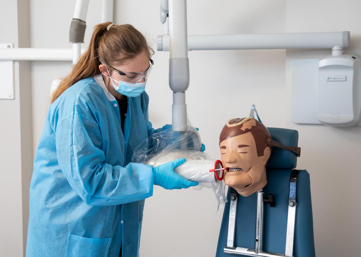 Dental assisting student in lab at Arizona College