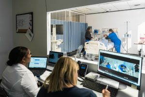 Nursing Degree Program Faculty and Students in Lab