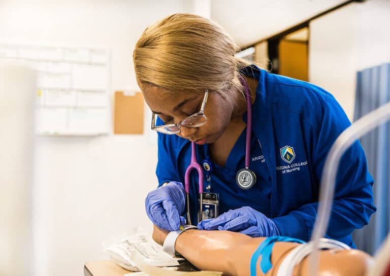 Nursing Program Student on campus in lab