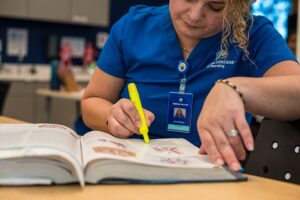 Arizona College of Nursing Student in Class Preparing For NCLEX Exam