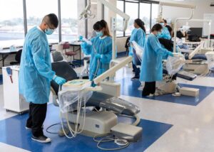 View of dental assistant school students during campus activities.