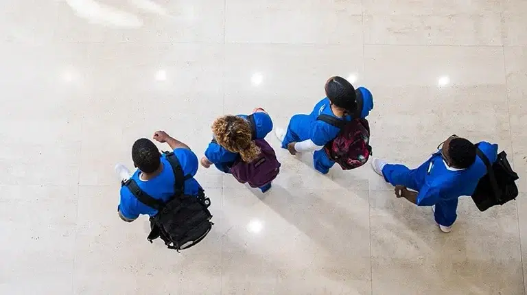 nursing program student walking on campus