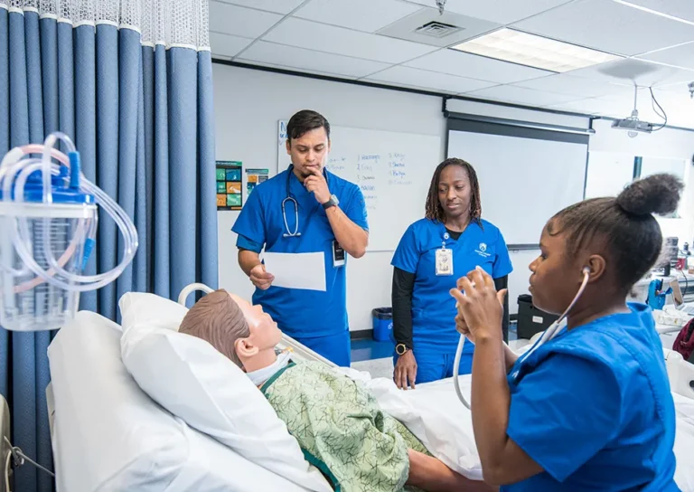 BSN Program students in a nursing school simulation lab with Nurse Manager