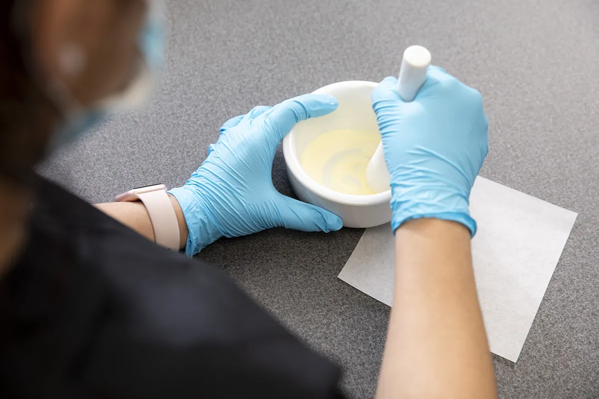 Pharmacy Technician School Student in Arizona with Medical Gloves